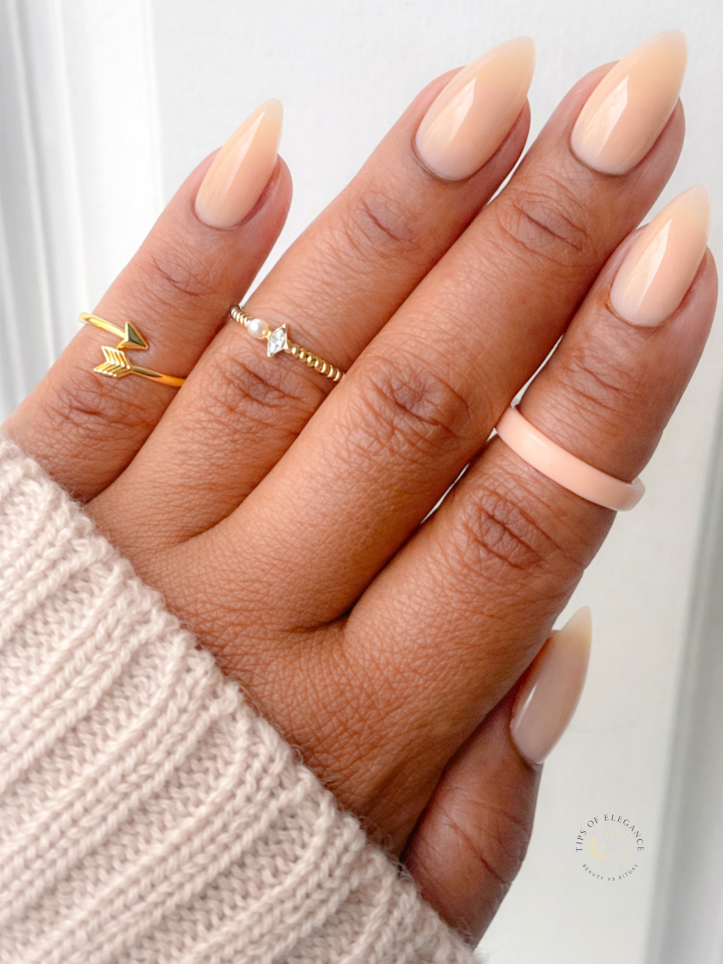 Honey Beige almond press on nails beige sweater with gold and peach rings