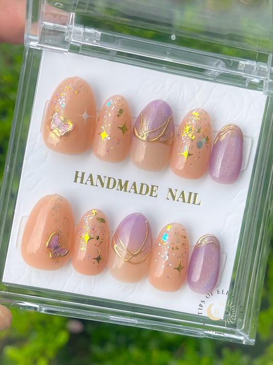 Curated assortment of handmade press-on nails featuring soft luxury solid, trendy designs, and season artistry representing the style of the bi-monthly Luxe Nail Subscription Box