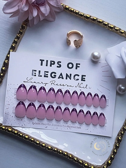 Pink and purple nail art tips on a 'Tips of Elegance' card with decorative elements.